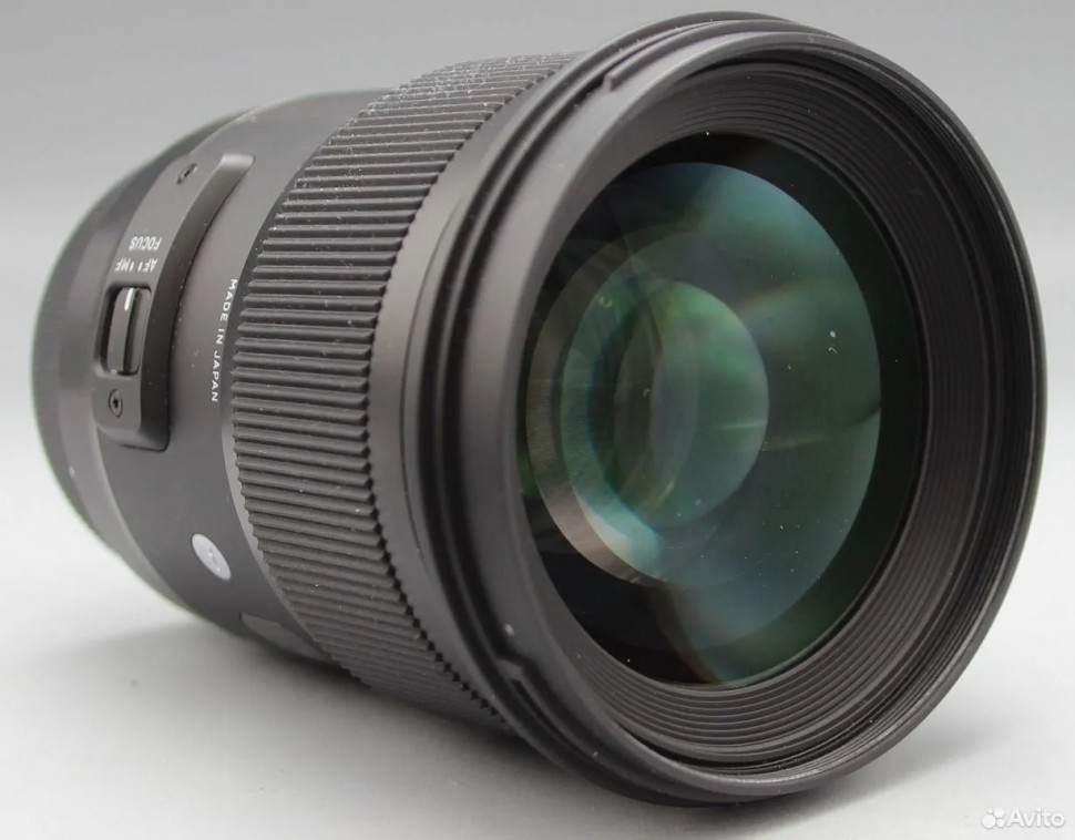 Sigma 50mm f/1.4 DG HSM Art Canon  (состояние 5-)